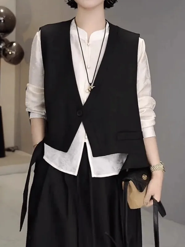 

Faionable European V-ne Asymmetrical Svel Vest Women's plus Size Loose Versatile Outerwear oulder Pad Top