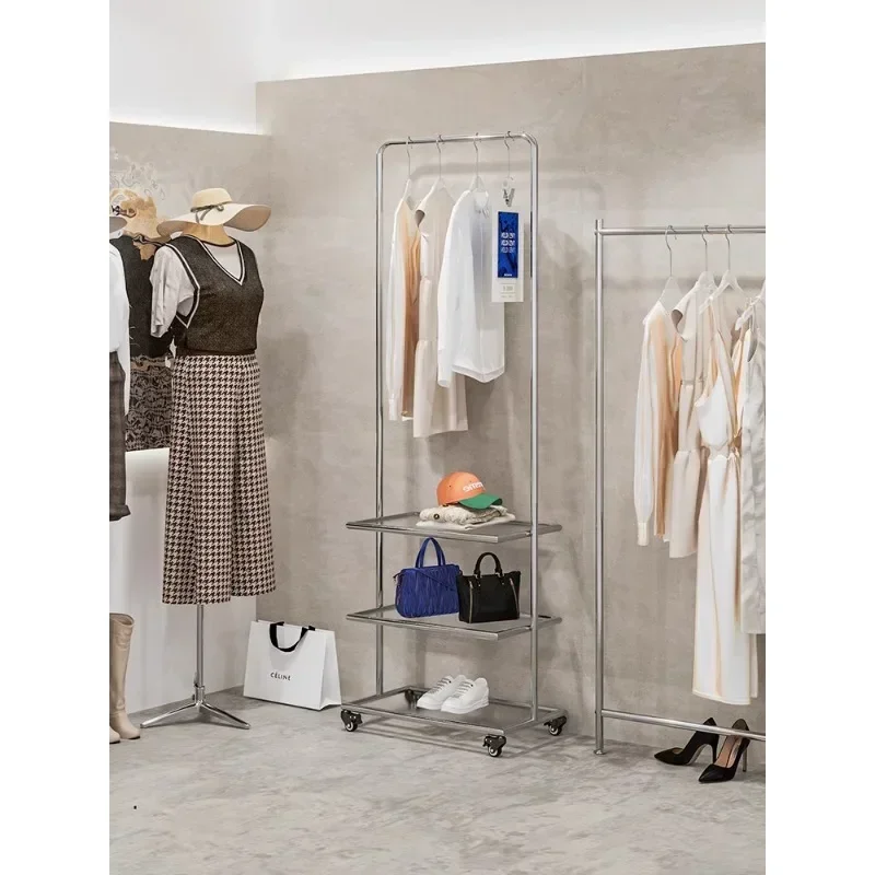 

Clothing store rack Floor-to-ceiling window rack Women's clothing shelf props Stainless steel movable display rack with wheels