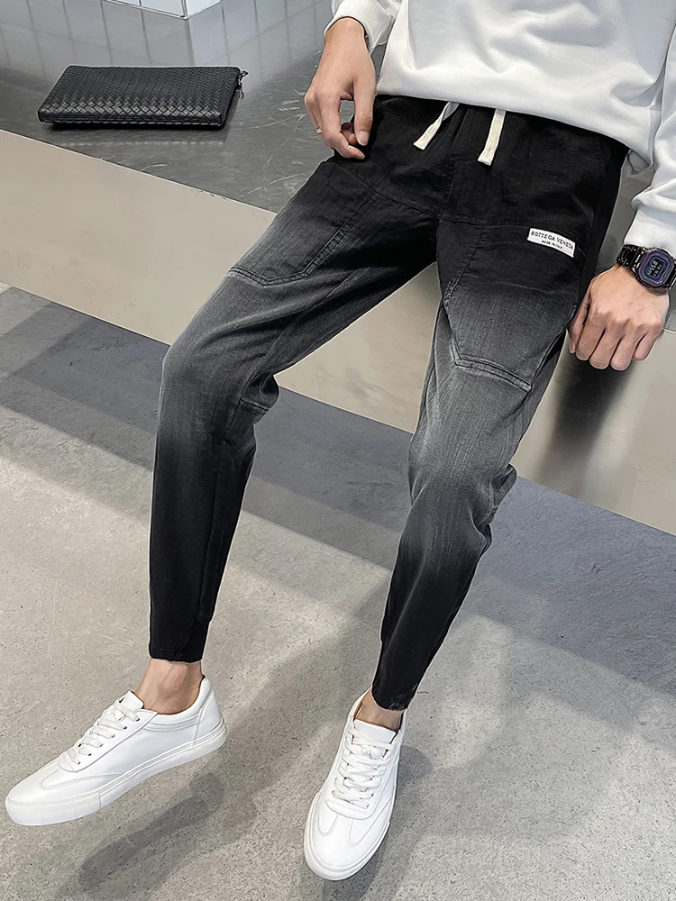 

Модные мужские джинсы приталенного кроя, осень-весна, универсальные модные длинные брюки с девятью точками, повседневные брюки со средней талией на молнии Fly ke...