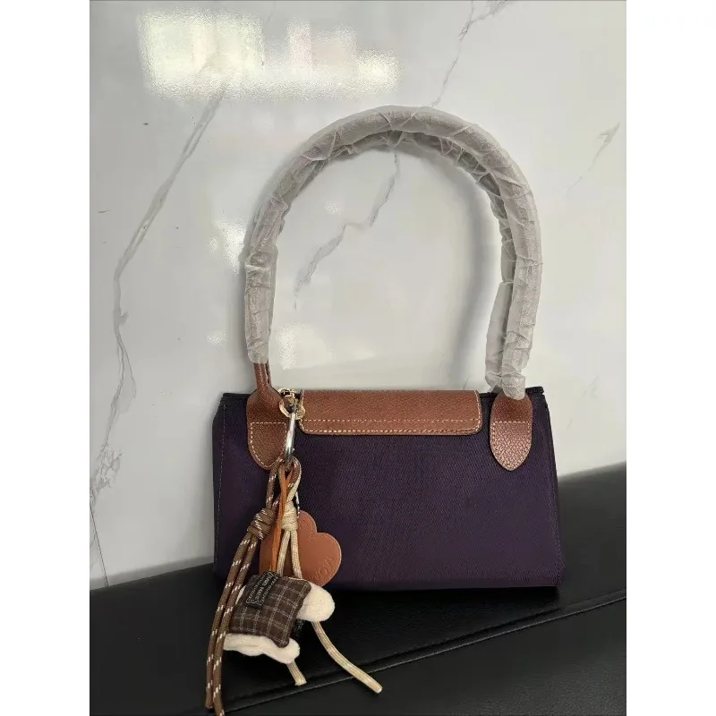 

Large French Style Nylon Women Tote 2025 Popular Soft Classic Pendant Ladies Shoulder Bag Multi functional Daily Commuter Bag