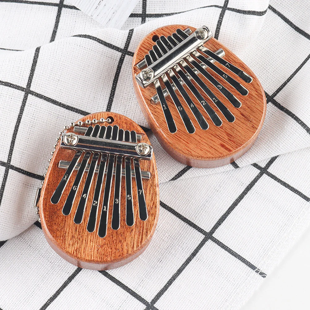 

1Pcs Kalimba Thumb Piano Mini Wooden 8 Keys Musical Instrument for Beginners Finger Piano Clear Melodious Sound