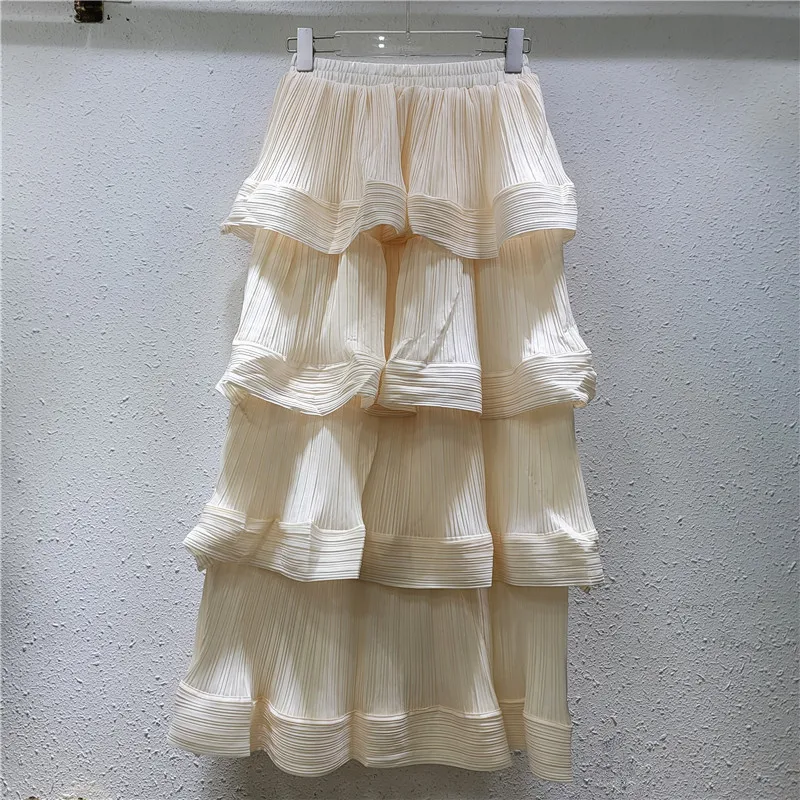 Tiered Ruffle Dress. Elegant pleats & a chic, designer silhouette for your standout fall wardrobe.