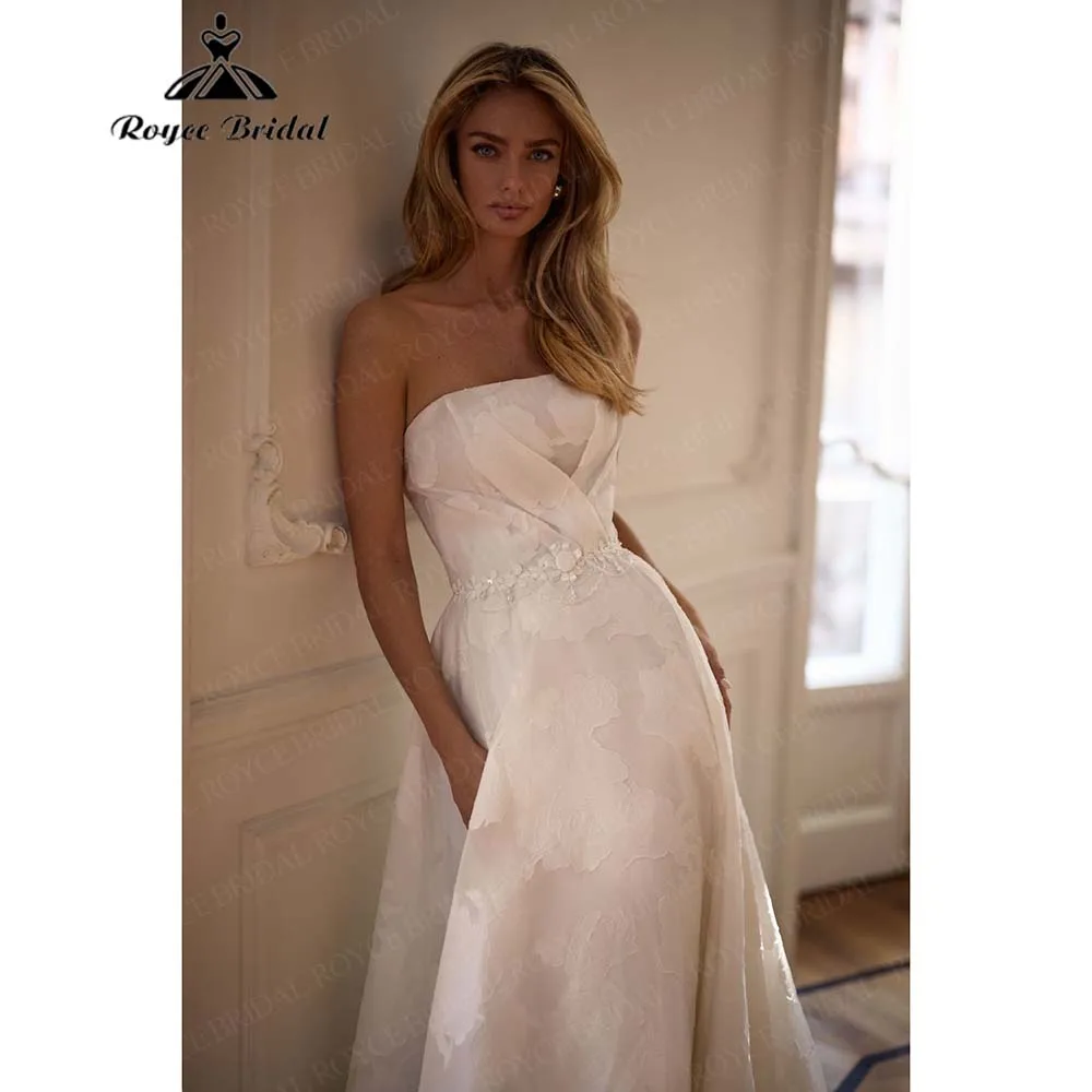 فساتين زفاف رقيقة خارج الكتف على شكل حرف a 2026 جيب مطرز بالخرز سويب تراين دانتيل فستان العرائس Vestidos De Novia مخصص