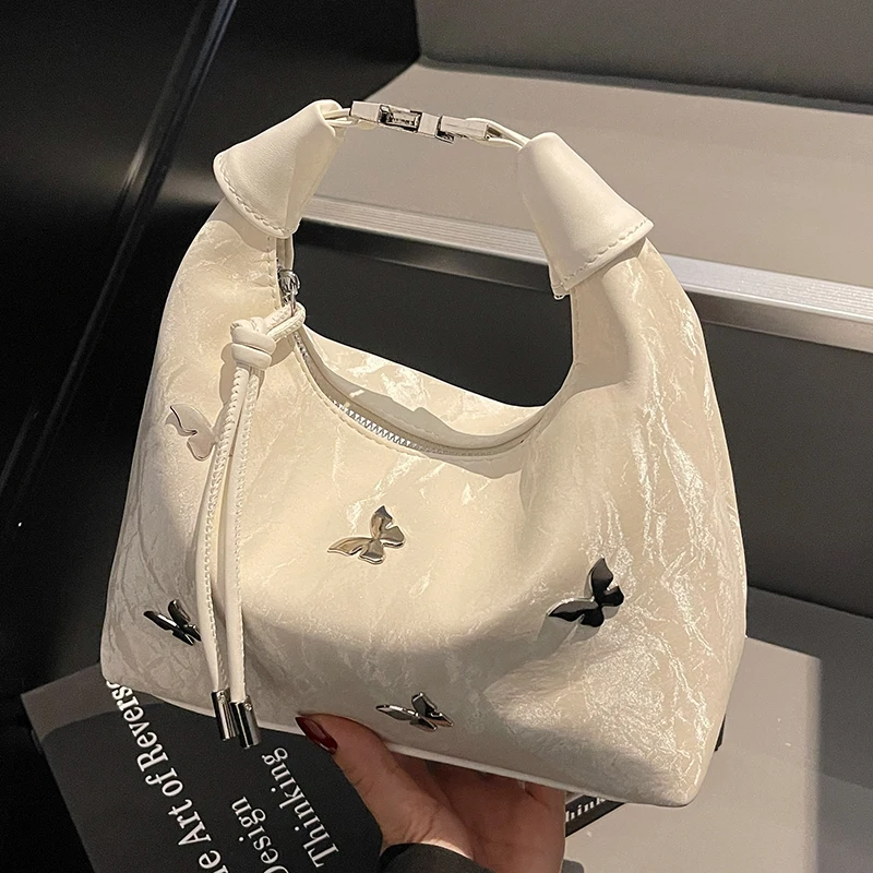 

Fashionable and exquisite handbag, simple texture popular solid color temperament shoulder bag, butterfly decoration, daily casu