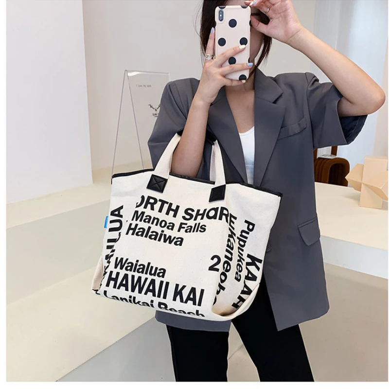 Letter canvas bag women\'s summer large capacity bag 2023 New Korean personality hand-carrying shopping bag shoulder tote bag 가방