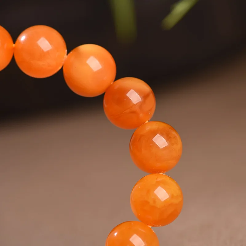 Natural Russian Amber Antique Single- Multi-Strand Bracelets, Featuring A Reddish-Brown