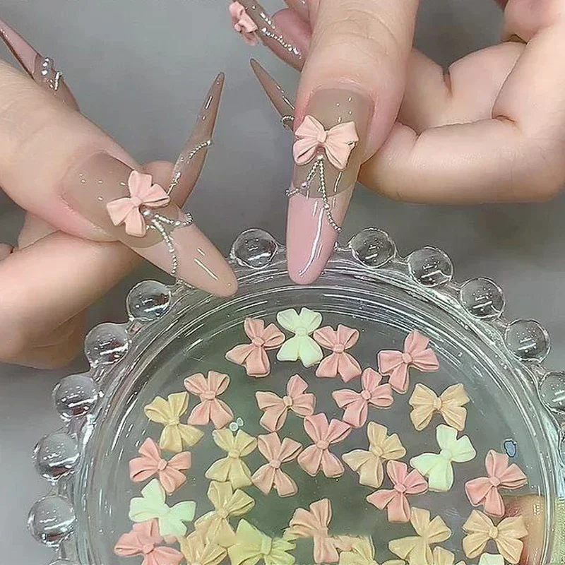 100pcs Mix Cream Style Bowknot Nail Charms 3D Aurora Bow Flat-back Gems Parts Nail Art Manicure Decorations