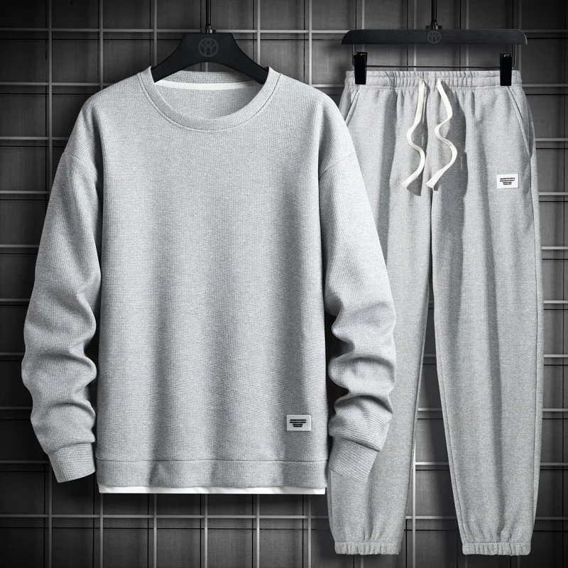 

Men's Casual Sports Suit Autumn Fashion Solid Color Crew Neck Sweater Loose Nine-point Pants Men