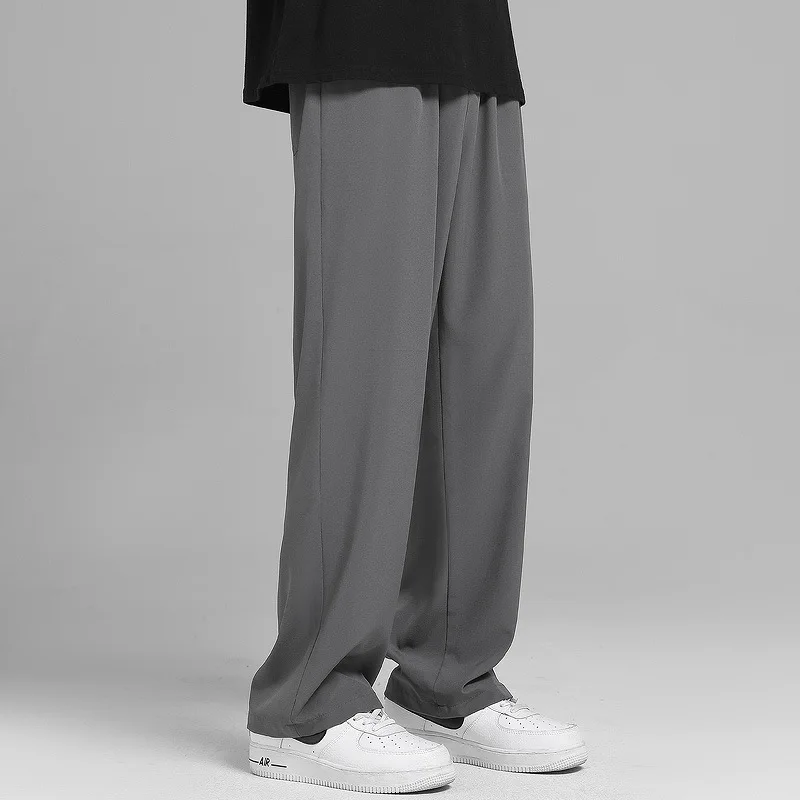 Nuovi pantaloni Casual estivi da uomo in poliestere traspirante moda coreana pantaloni a vita larga con fascia Semi larga pantaloni larghi dritti