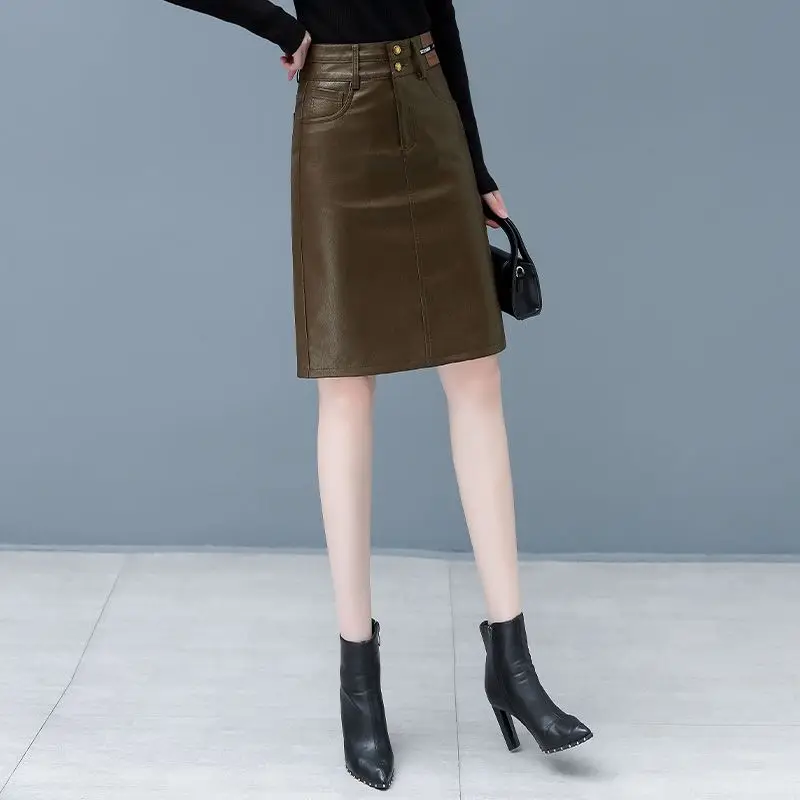 

2023 Autumn New Women High-End Solid Color Pu Leather Skirt Female Temperament High Waist A- Line Sheath Casual One-Step Skirt