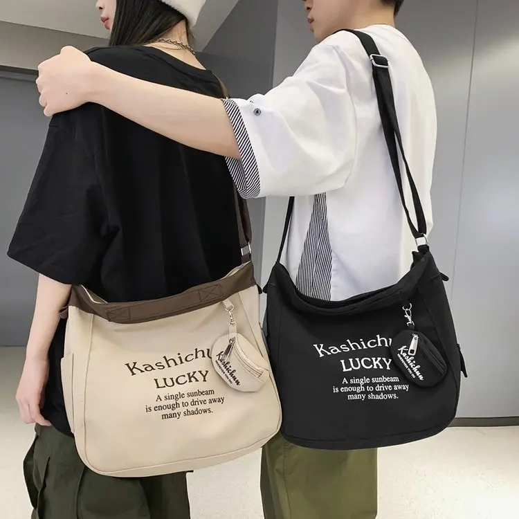 

2026 New Canvas Bag Japanese Ins Large Capacity Commuter Shoulder Bag Canvas Bag Niche Literary and Art Versatile Crossbody Bag