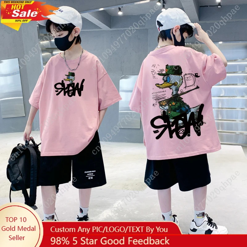 ملابس الأطفال الكورية 2025 الفتيان الأمريكية الكرتون بطة طباعة الجرافيك تي شيرت 100% القطن تي شيرتات قصيرة الاكمام ملابس فتاة #1