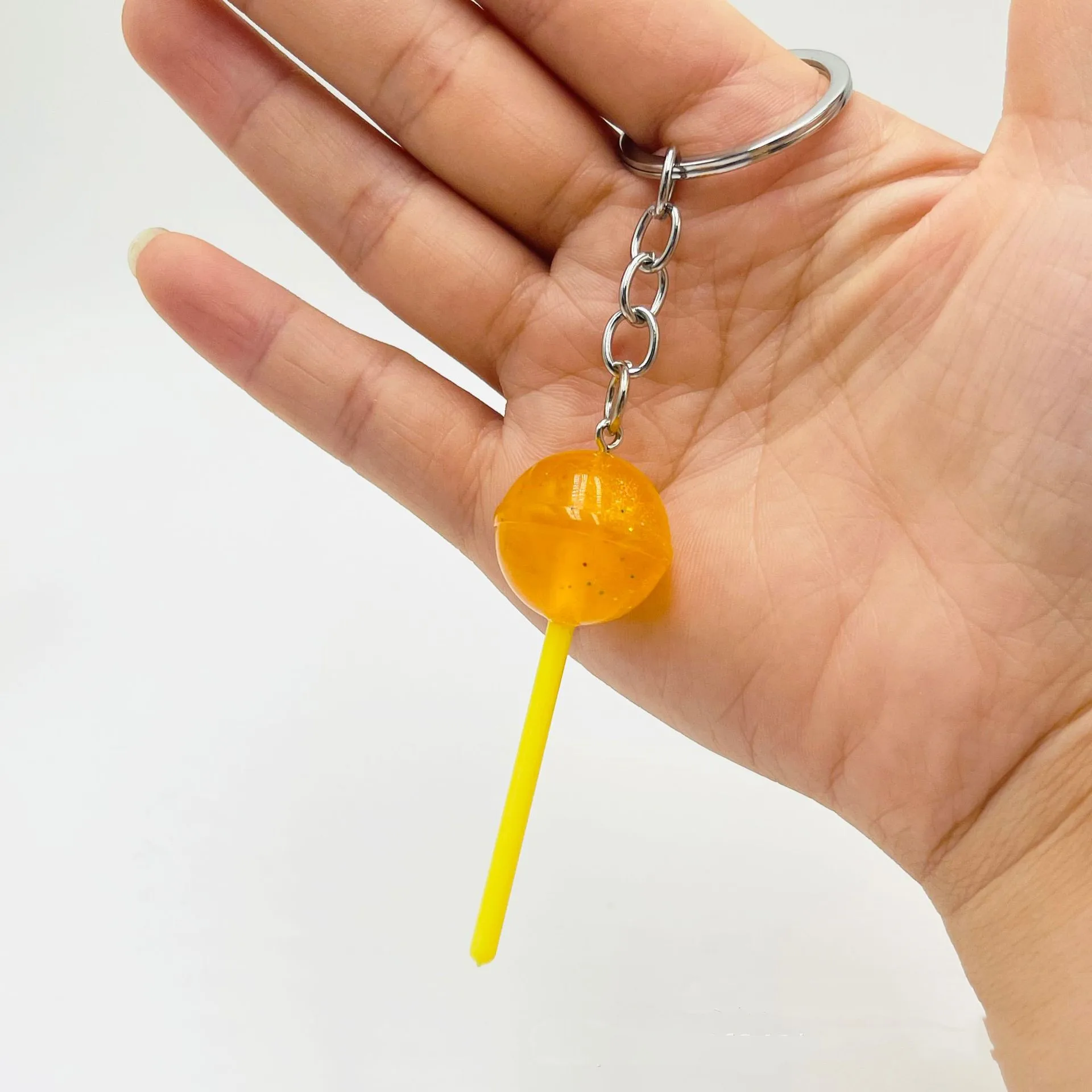 1PCS Simulation lollipop keychain transparent luminous resin accessories candy bag ornaments creative gifts spot. Random color