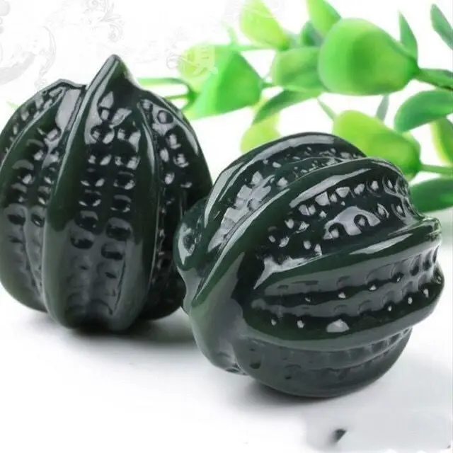 

Пара нефритовых ручек из сапфирового ореха