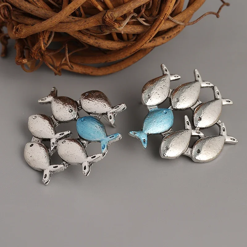 Swimming Against The Current Silver Color Stud Earrings. Mismatch. School of Fish with One Blue Swimming Upstream