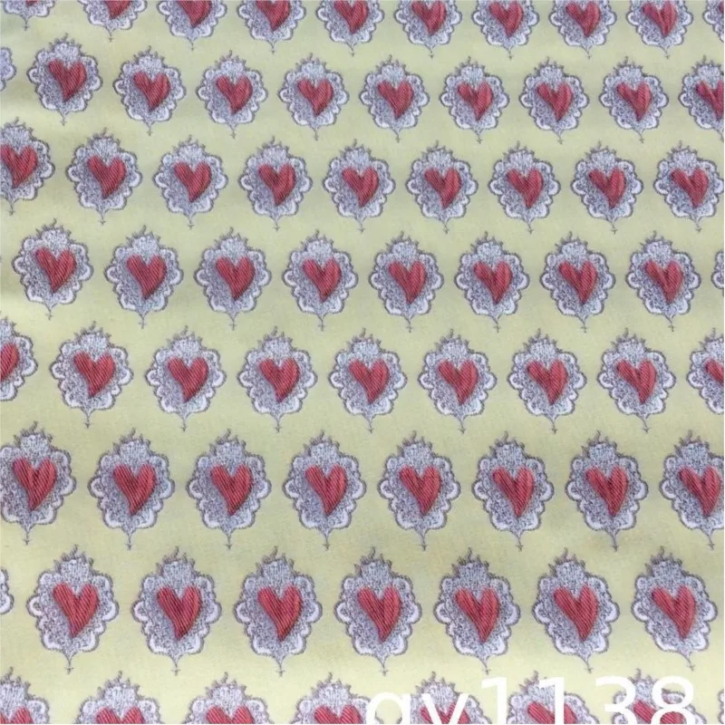 Embossed heart-shaped jacquard fabric with a textured for women's suits windbreakers hair bands handbags and skirt fabrics