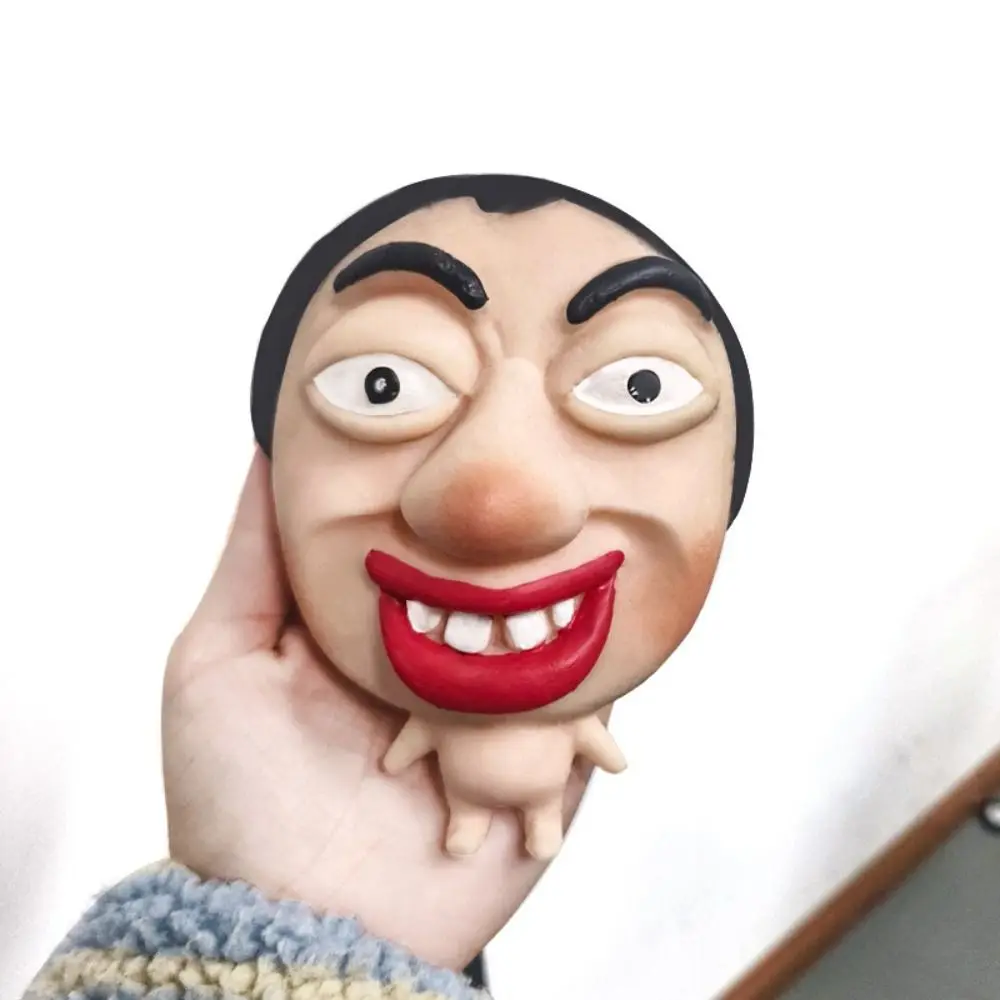 ゆっくり戻る醜い顔のスクイーズ玩具、捏ねる弾力のある表情キャラクターのスクイーズ玩具、手作りのピンチ玩具