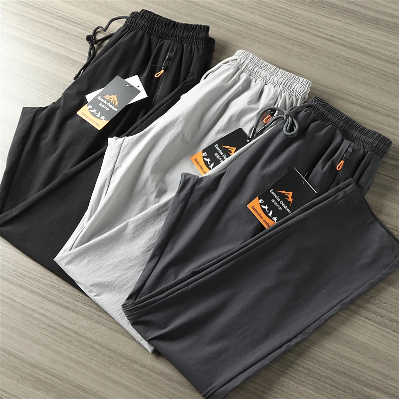 

Мужские повседневные спортивные брюки из ледяного шелка с быстрым высыханием и дышащим эффектом, профессиональные, для весны и лета, новые, свободного кроя, на молнии