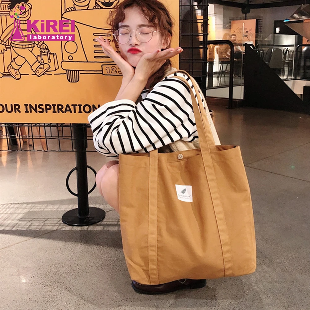 New retro ladies shoulder bag simple solid color small fresh canvas bag literary women\'s buckle tote bag large capacity handbag