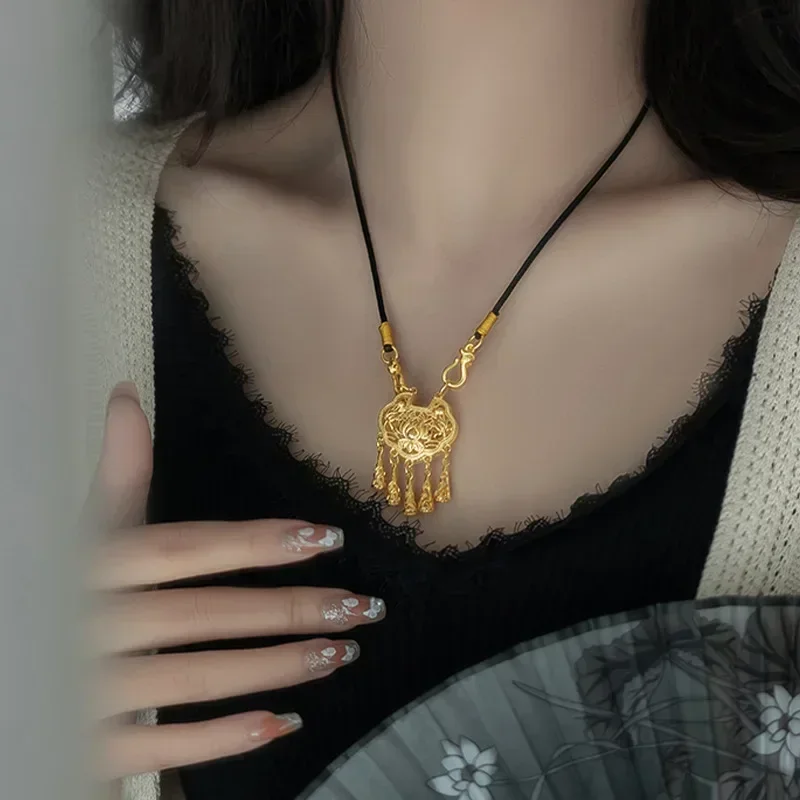

9999 real gold 24K yellow gold Concentric Lotus Tassel Hollow Lotus Peace Lock Pendant