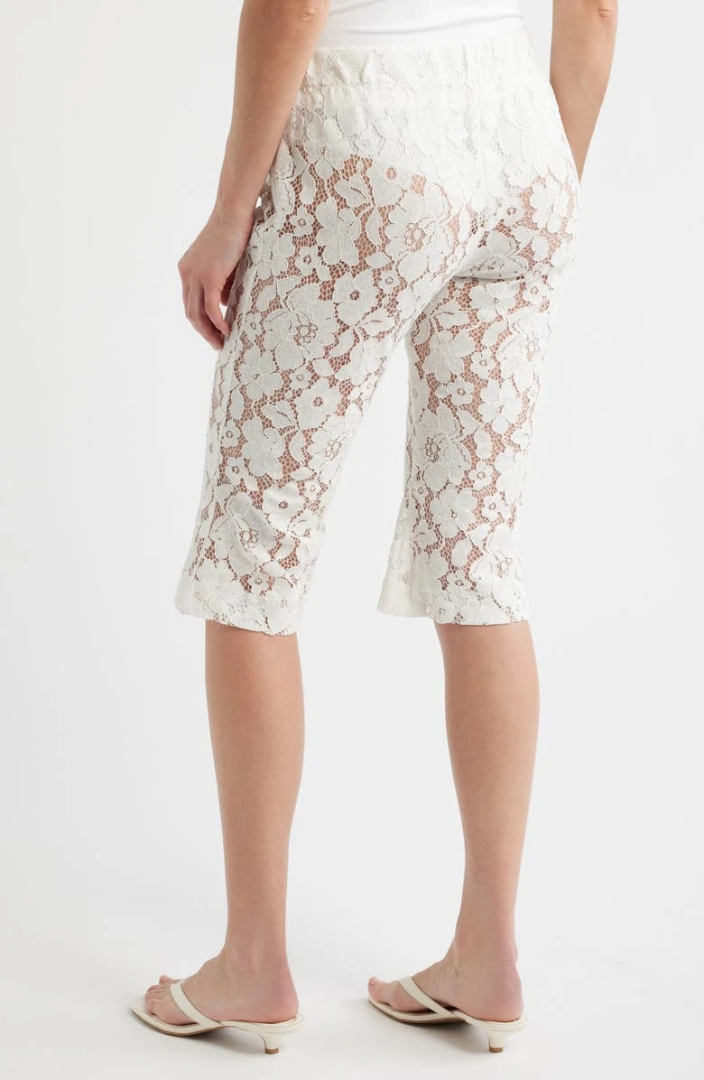 

Elevate Your Summer Style with our Lace Seven-Point Pants in Black and White - Available in S, M, L