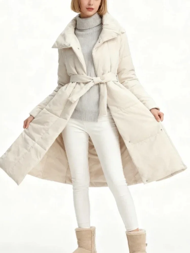 

2025 Autumn Winter New Female Outwear Warm Solid Longline Puffer Long Coat Women Lapel Collar Lace Up Belt Flush Slim Coat