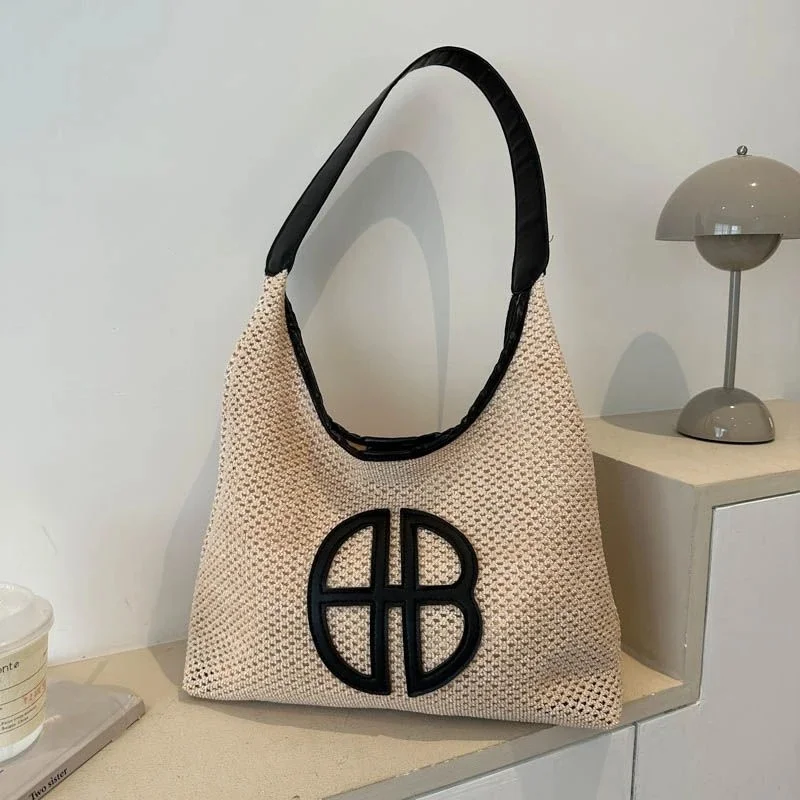 

Новая сумка подмышками 2025 года, специально предназначенная для женщин с помощью его уникального дизайна с помощью полого соломенного плетения.