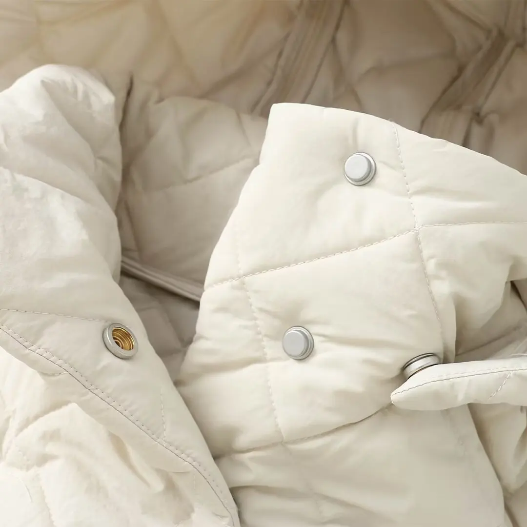 Abbigliamento donna 2025 autunno e inverno nuova giacca lunga in cotone con cappello rimovibile a collo alto in stile europeo e americano