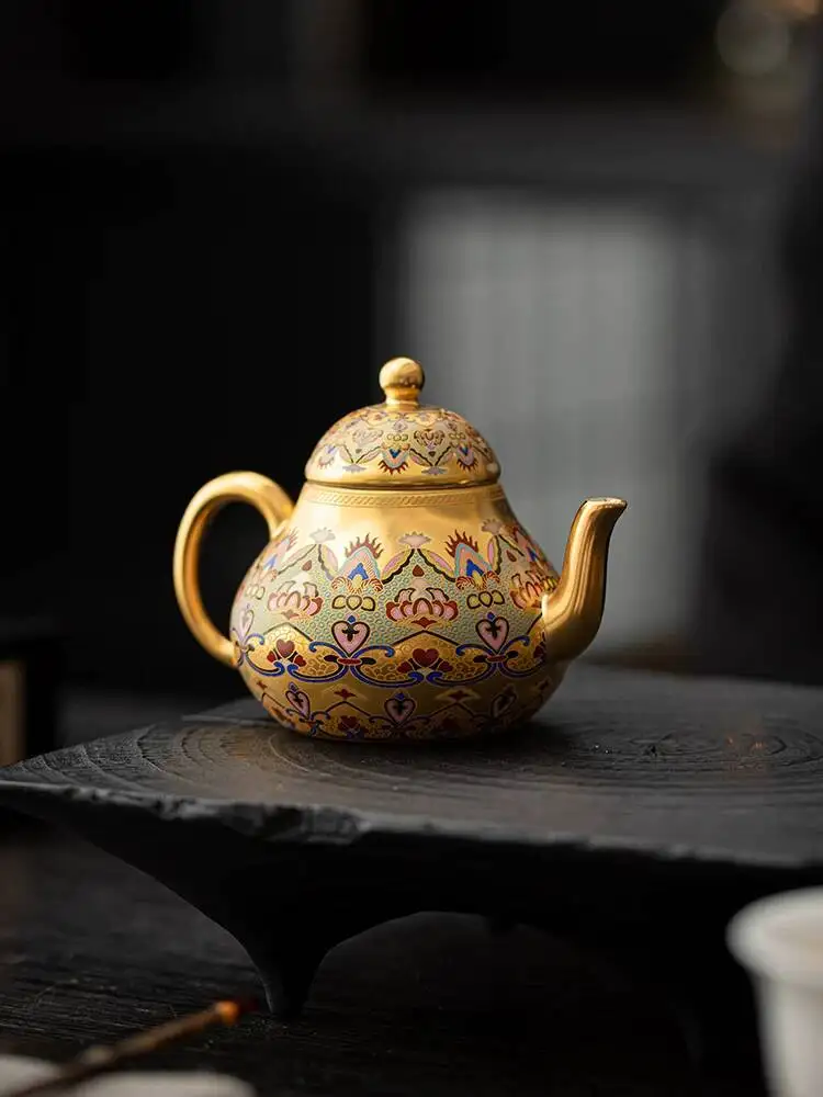 teiera-a-forma-di-pera-dunhuang-impression-del-maestro-zhou-hongjie-in-ceramica-dorata-a-oro-puro-set-da-te-kung-fu-per-uso-domestico-cinese
