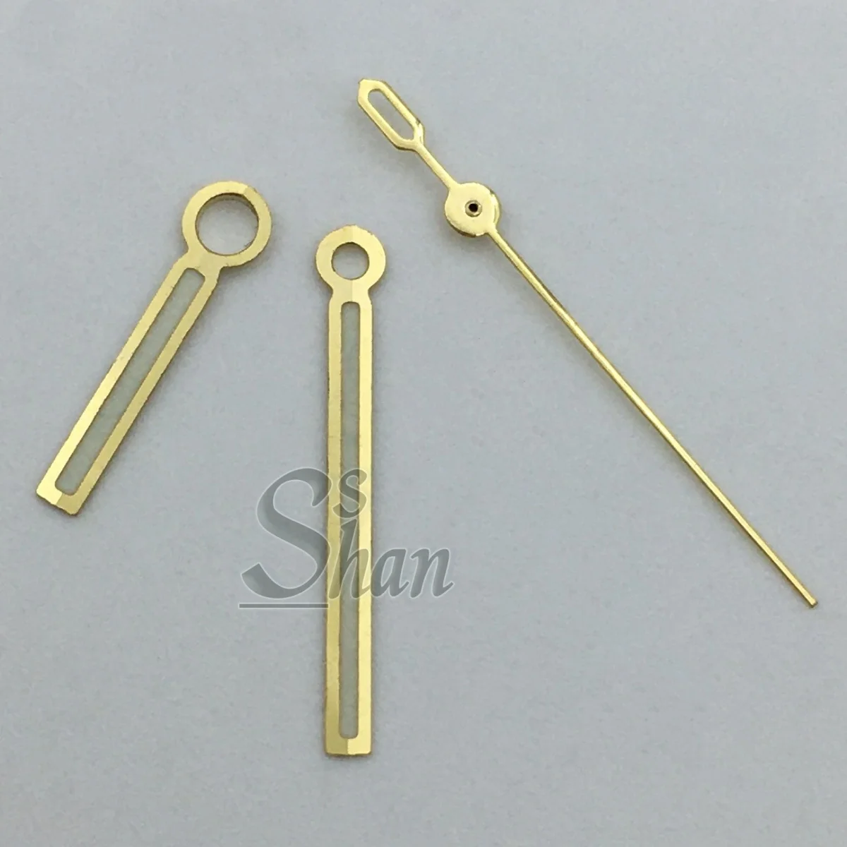 Wysokiej jakości wskazówki zegarkowe NH35 12,5*12*8mm z zielono-niebieską luminescencją, pasujące do mechanizmów NH35 i NH36, złote, srebrne, różowe złoto.