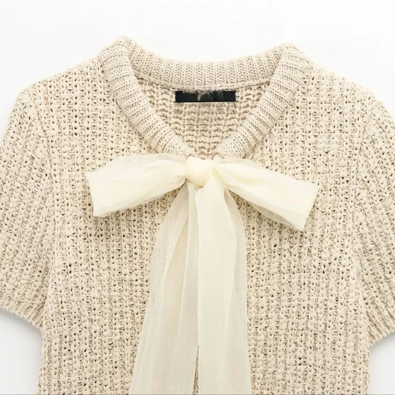 Maglione lavorato a maglia con lacci da donna con fiocco o-collo maniche corte monopetto orlo elastico solido semplice top primavera nuovo maglione chic