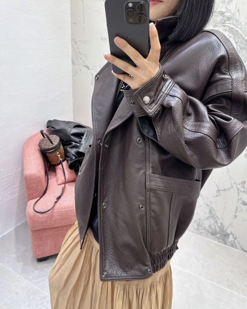 Lussuoso cappotto di pelle di pecora da donna Autunno Inverno 2025 Moda fibbia a doppia fila in vera pelle naturale vestibilità ampia