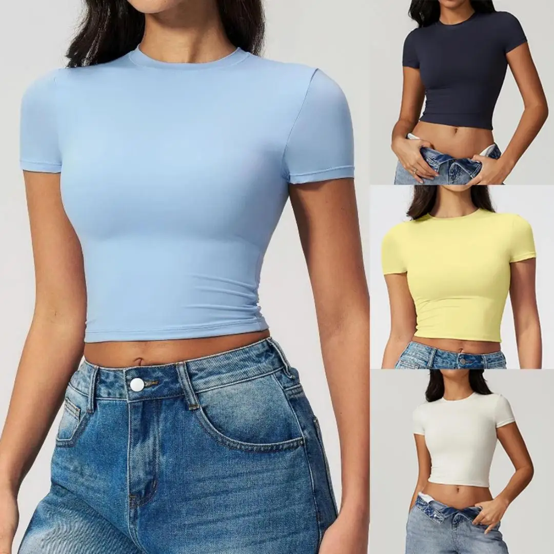 Un t-shirt de sport moulant pour femmes, à séchage rapide, à manches courtes, idéal pour le yoga, le pilates, la course à pied et l'exercice physique.