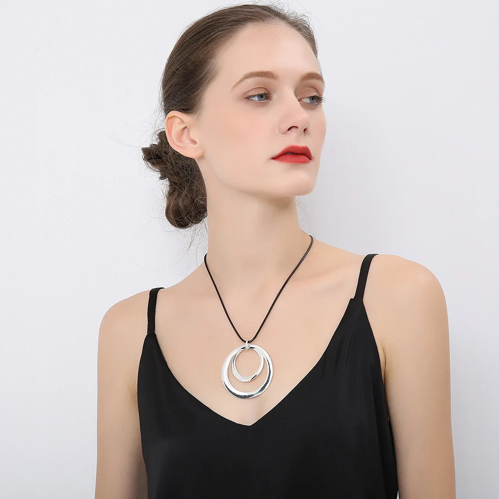 special jewelry popular European and American fashion simple double ring pendant women's ring alloy short ne