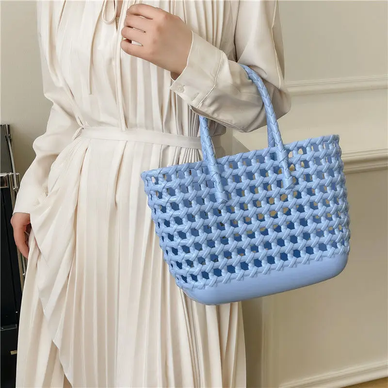 

2024 Summer New Women's Bag Hollow Weaving Handheld Vegetable Basket Bag Holiday Beach Bag