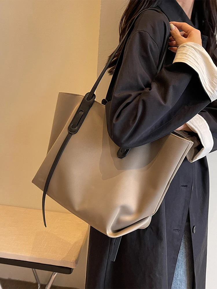 

Casual Women's Large Capacity Shoulder Tote Bag Fashionable Commuting Shopping Bag ILINX Brand Soft Handle Hard Bag Summer 2024