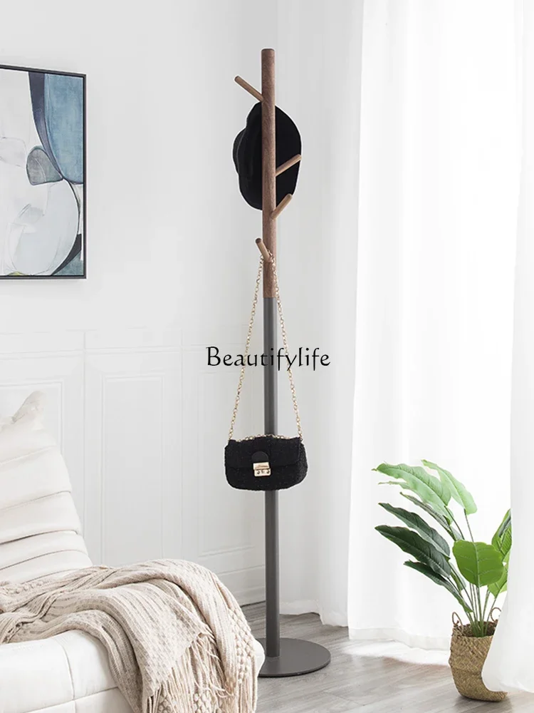 

Nordic modern simple coat rack home living room black walnut solid wood creative floor rack