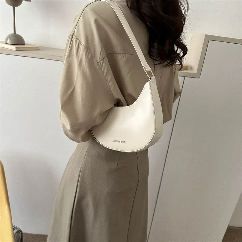 Bolsos de hombro de diseño de lujo para mujer, bolso Hobo de media luna, bolsos de marca a la moda para mujer, bolso de mano pequeño de cuero de vaca