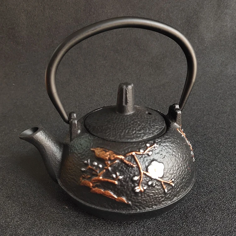 

Collection of iron kettle, teapot, handkettle ornaments, film and television props