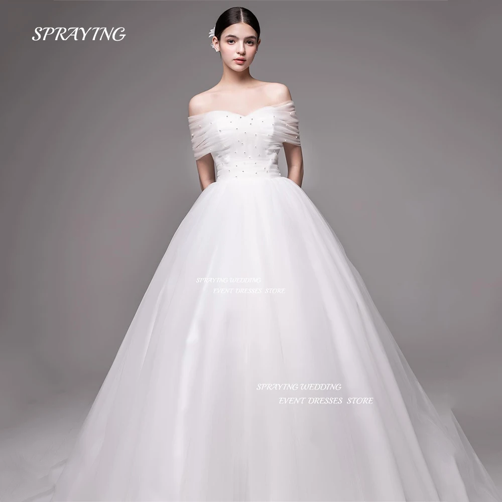 

SPRAYING lvory Off Shoulder Wedding Dress Shiny Beading Short Sleeve A Line Bridal Gown Tulle Vestidos De Novia Saudi Arabia