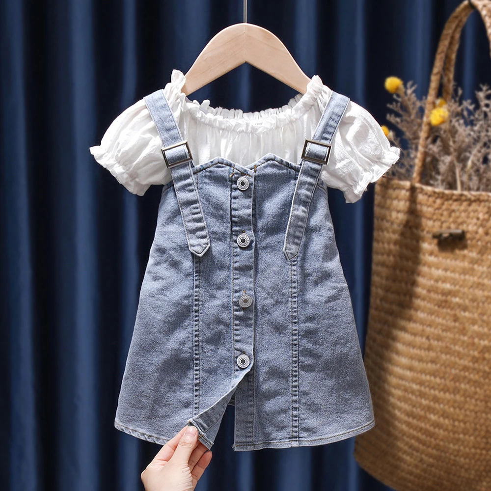 

Cute Children's Denim Dress 2piece Set Girl's 2024 Summer Pleated Ruffles Short Sleeve T-shirt+Single Breasted Camisole Skirt