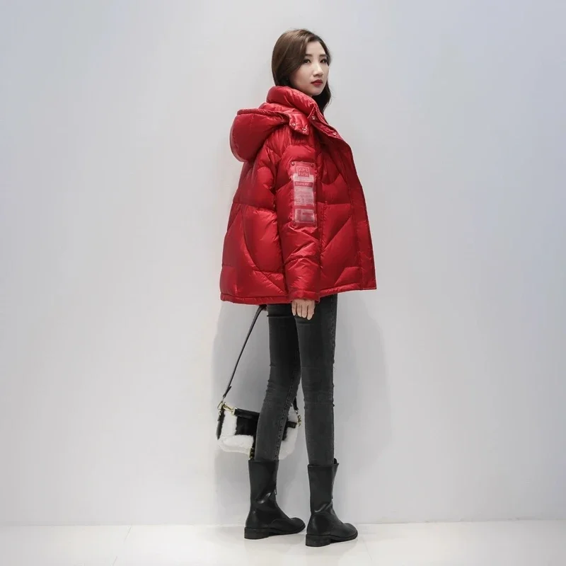 Krótka kurtka puchowa damska zimowa 2025 nowa moda luźna z kapturem lekka płaszcz z białego puchu kaczygo wiatroodporna ciepła parka