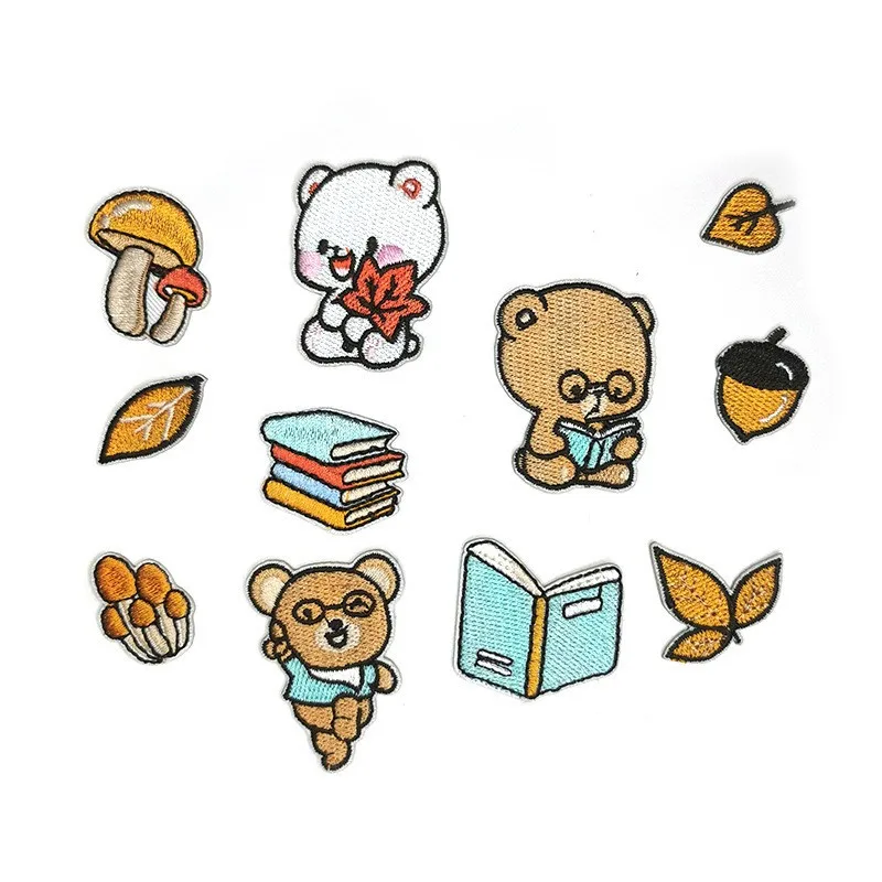 

50pcs/Lot luxury anime Embroidery Patch Golden Top Mushroom Bear Book Rabbit Clothing Decoration Accessory craft Diy Applique