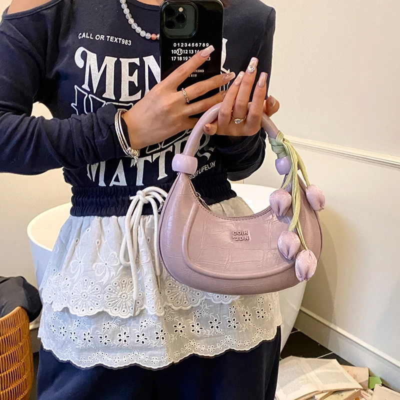 

Korean niche fashion hand-carrying pea bag 2025 new small fresh flower language shoulder bag high-end simple women's bag