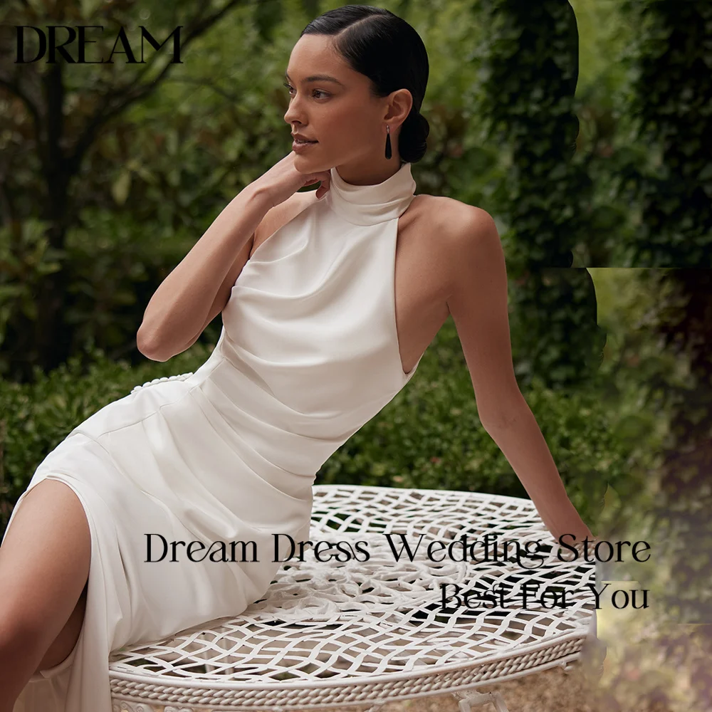 

Индивидуальное роскошное свадебное платье Dream: с высоким воротником, лифом-халтер, открытой спиной, драпировкой на талии, из атласа, фасон «русалка», с высоким разрезом и шлейфом