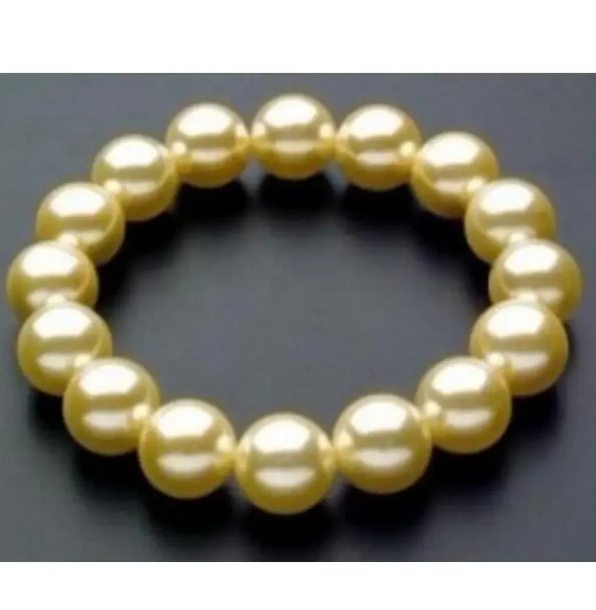 

new hot Wonderful South 10mm Yellow Sea Shell Pearl Bracelet AAA 7.5"