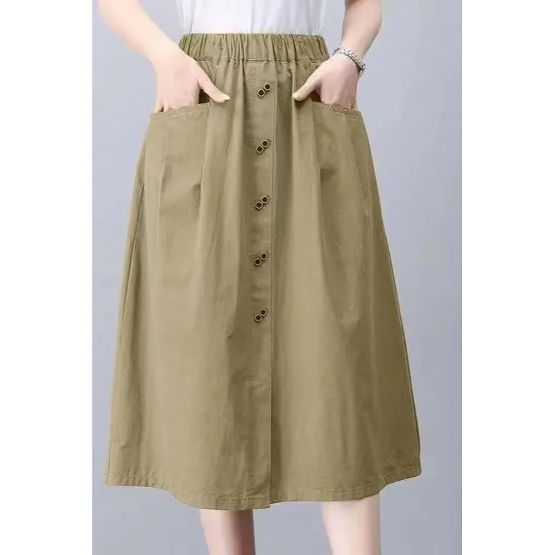 Taille haute 2025 tempérament nouvelle mode décontracté élastique mi-longue mince polyvalent poche jupe