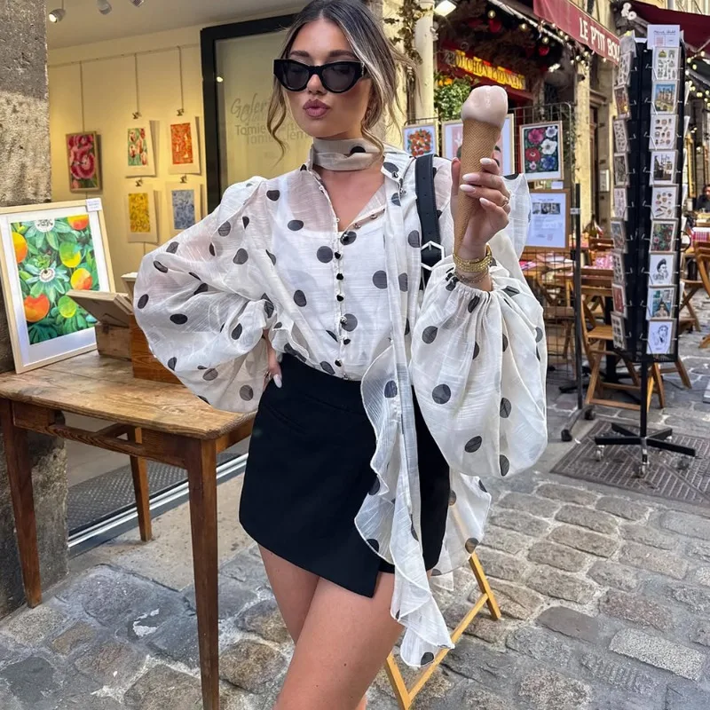 Women's Polka Dot Ruffle Blouse with Lace-Up Neck and Sheer Detail