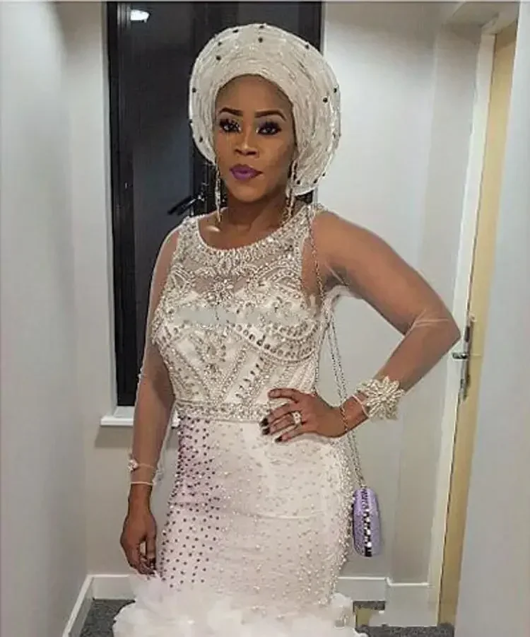Vestido de novia de sirena de talla grande africano nigeriano personalizado, vestidos de novia formales personalizados con cuentas de cristal y volantes de Organza ostentosos