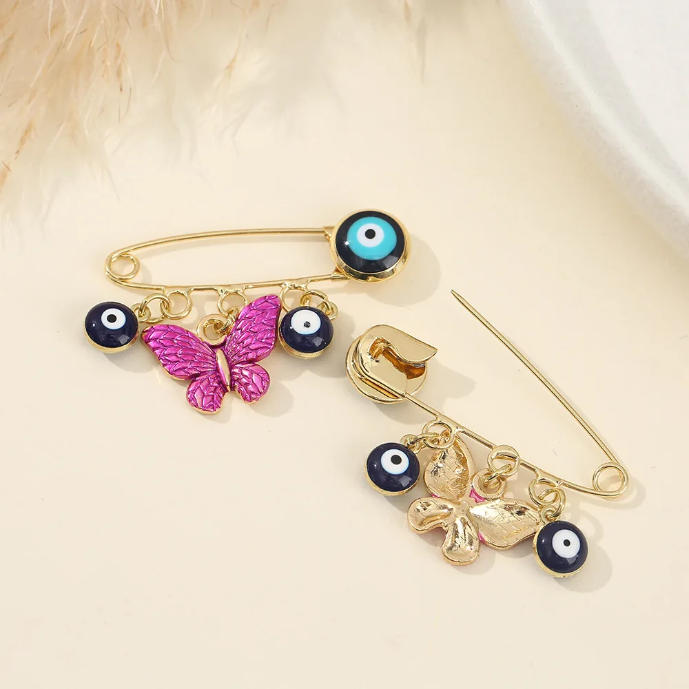 Creative minimalist brooch, European and American devil's eye pin, Beetle bee bow element, blue eye pin